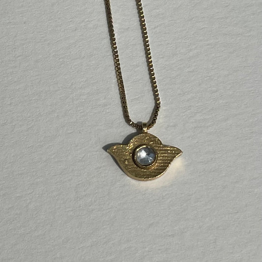 gold evil eye