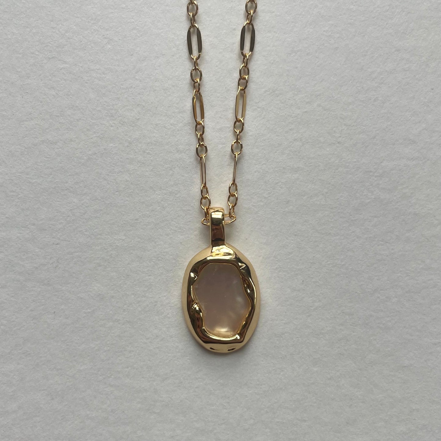 gold shell pendant