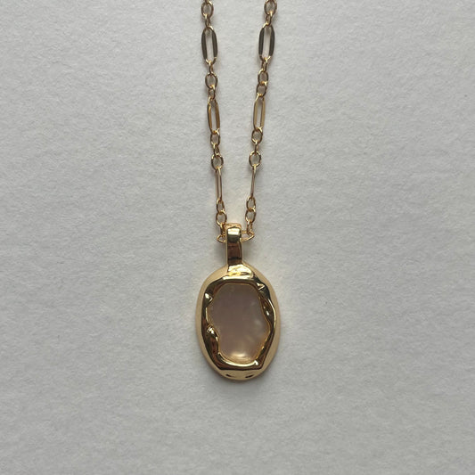 gold shell pendant