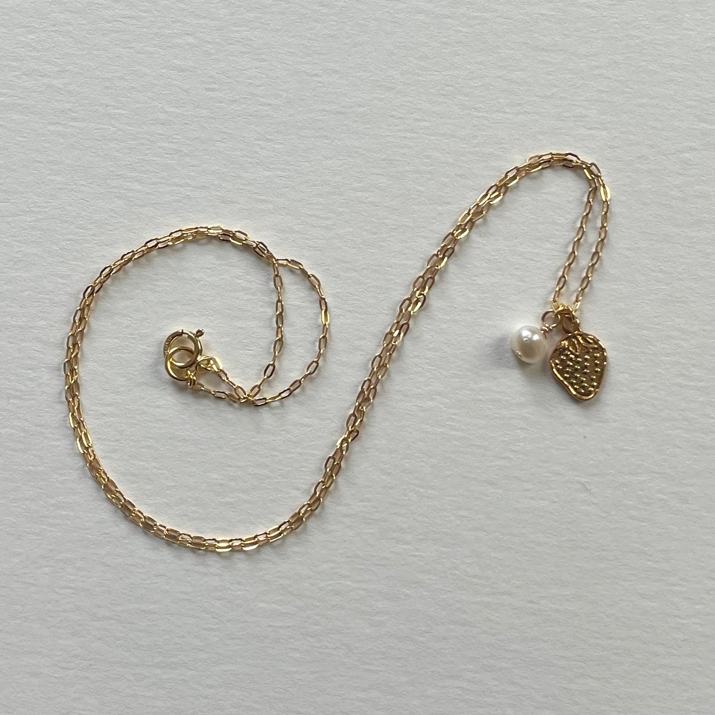 gold charms V