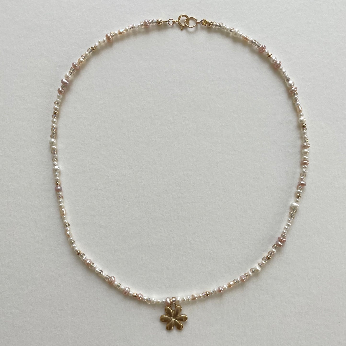 gold beaded charm