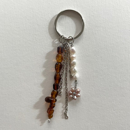 pearl flower drop keychain in dark amber