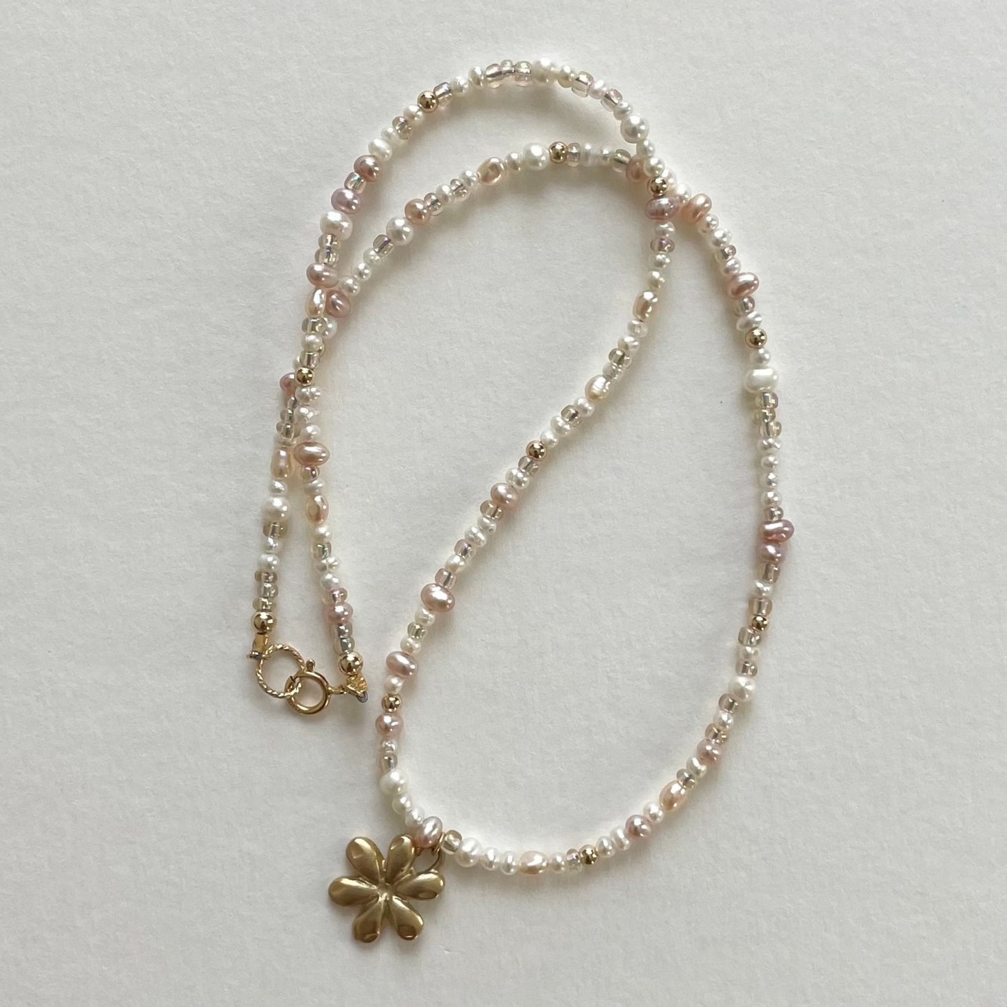 gold beaded charm