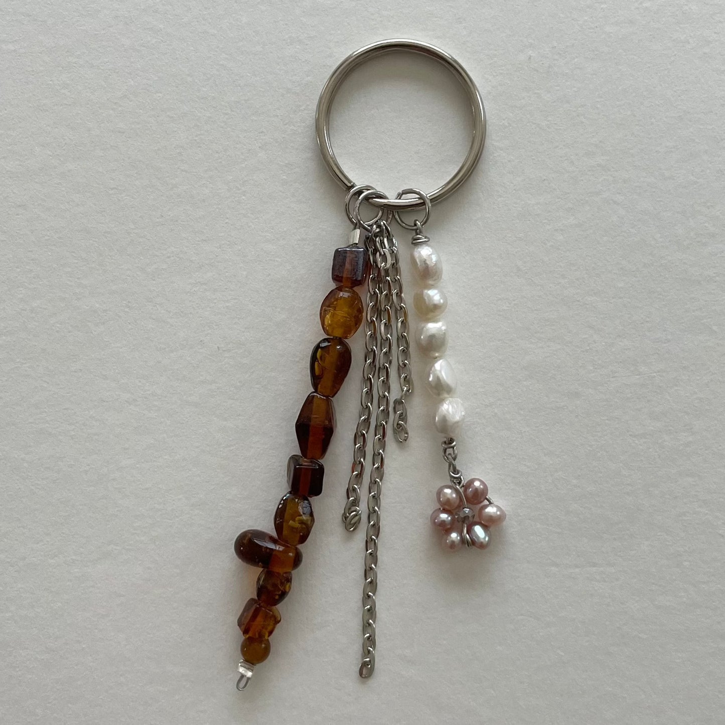 pearl flower drop keychain in dark amber