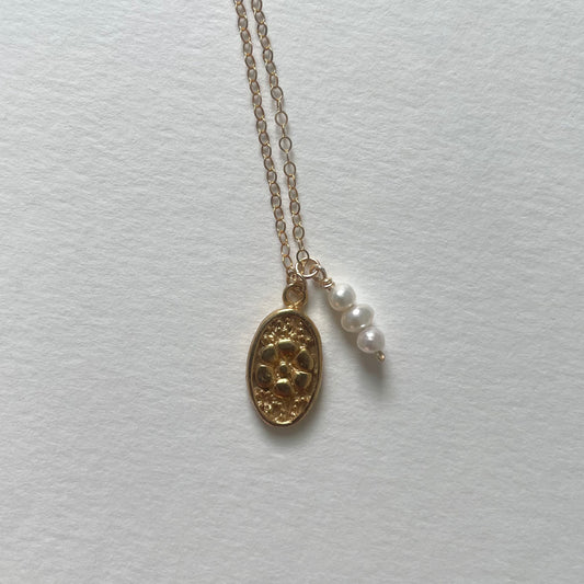 gold oval flower